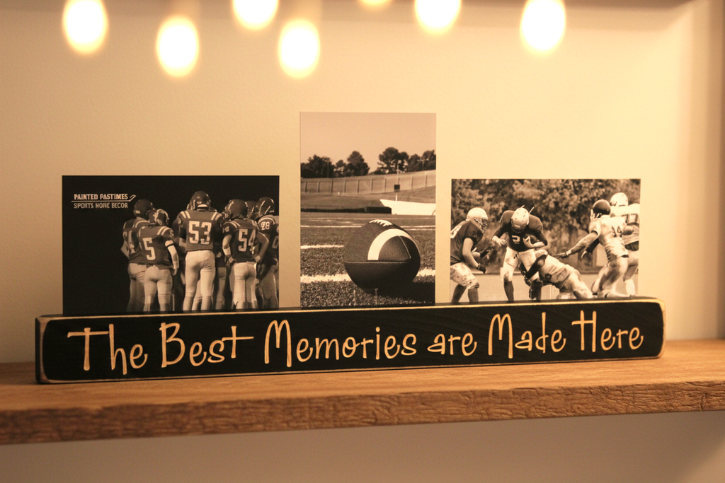 A wooden football-themed photo frame sign on a shelf, featuring three customizable black-and-white photos of a football game and the text 'The Best Memories are Made Here' in lasered lettering.
